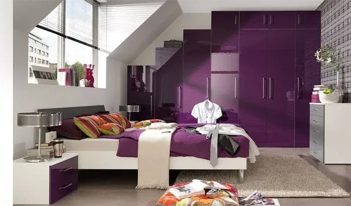 contemporary bed under big window feng shui purple theme